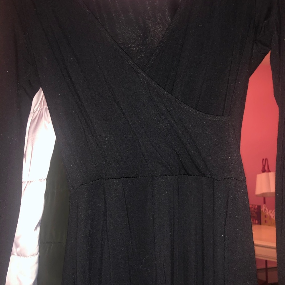 Black knee length dress with a v neck